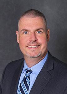 Dr. Christopher J. Adams Dr. Christopher J. Adams