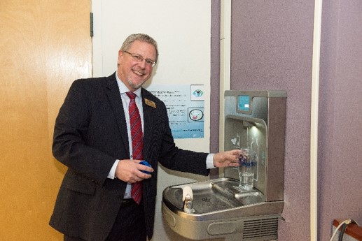 Dean Lundburg refilling his water bottle