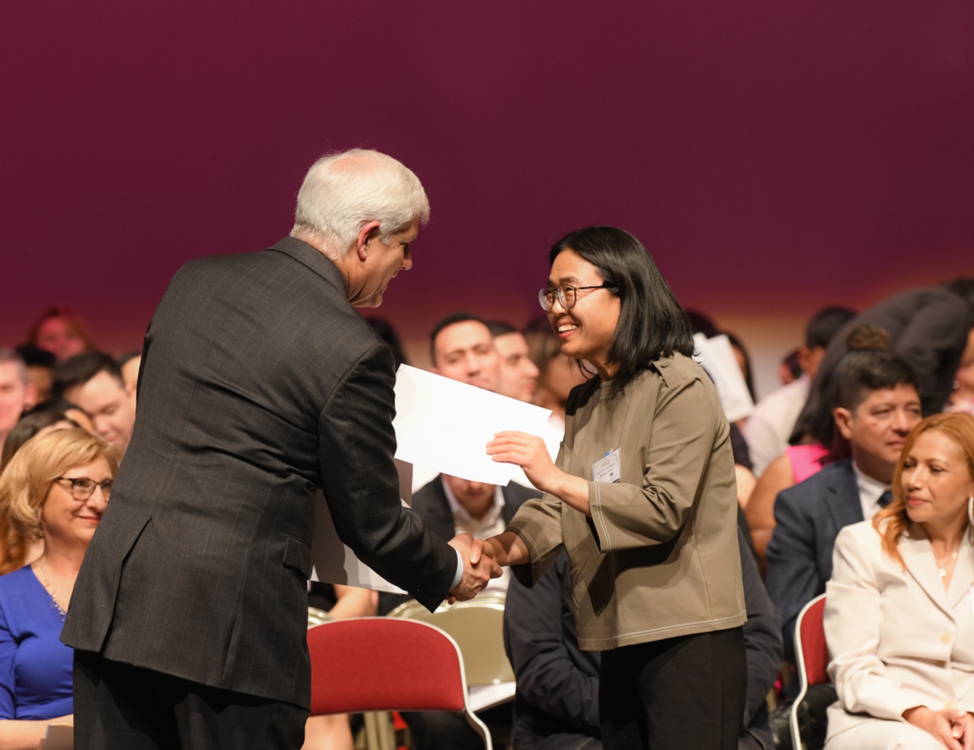 ESL Grads accepting certificate
