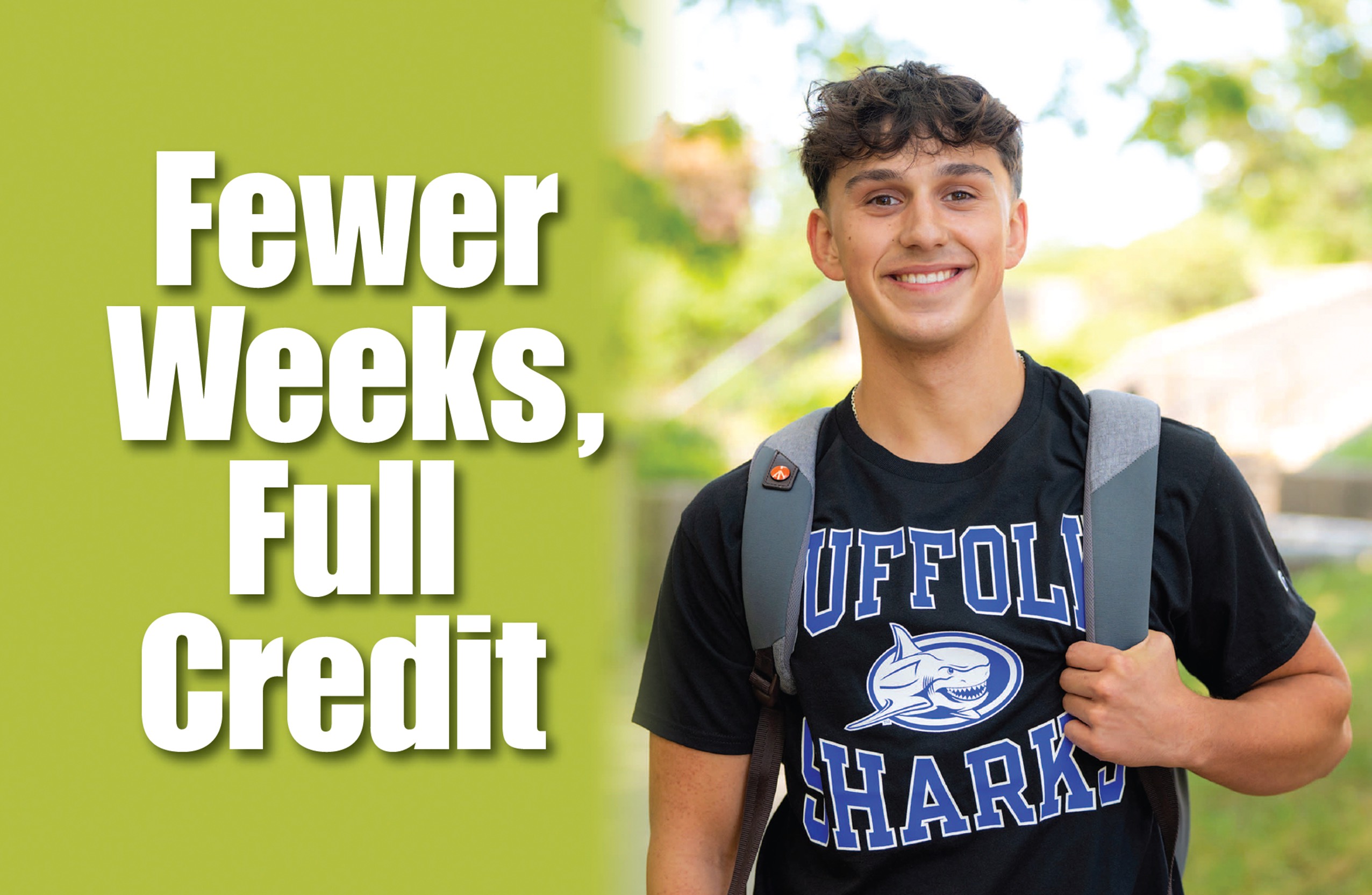 Few Weeks, Full Credit - A male student standing outside on campus wearing a Suffolk sweatshirt.