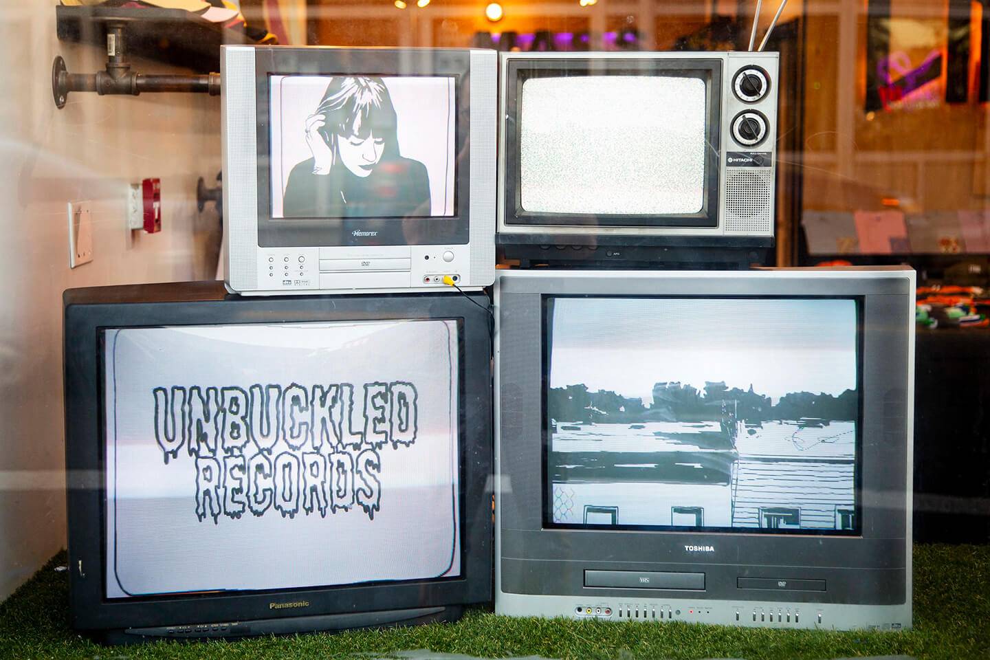 Art by Emma Wasielke - Window display at unbuckled records.