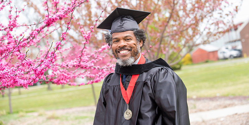 Guy in graduation gown