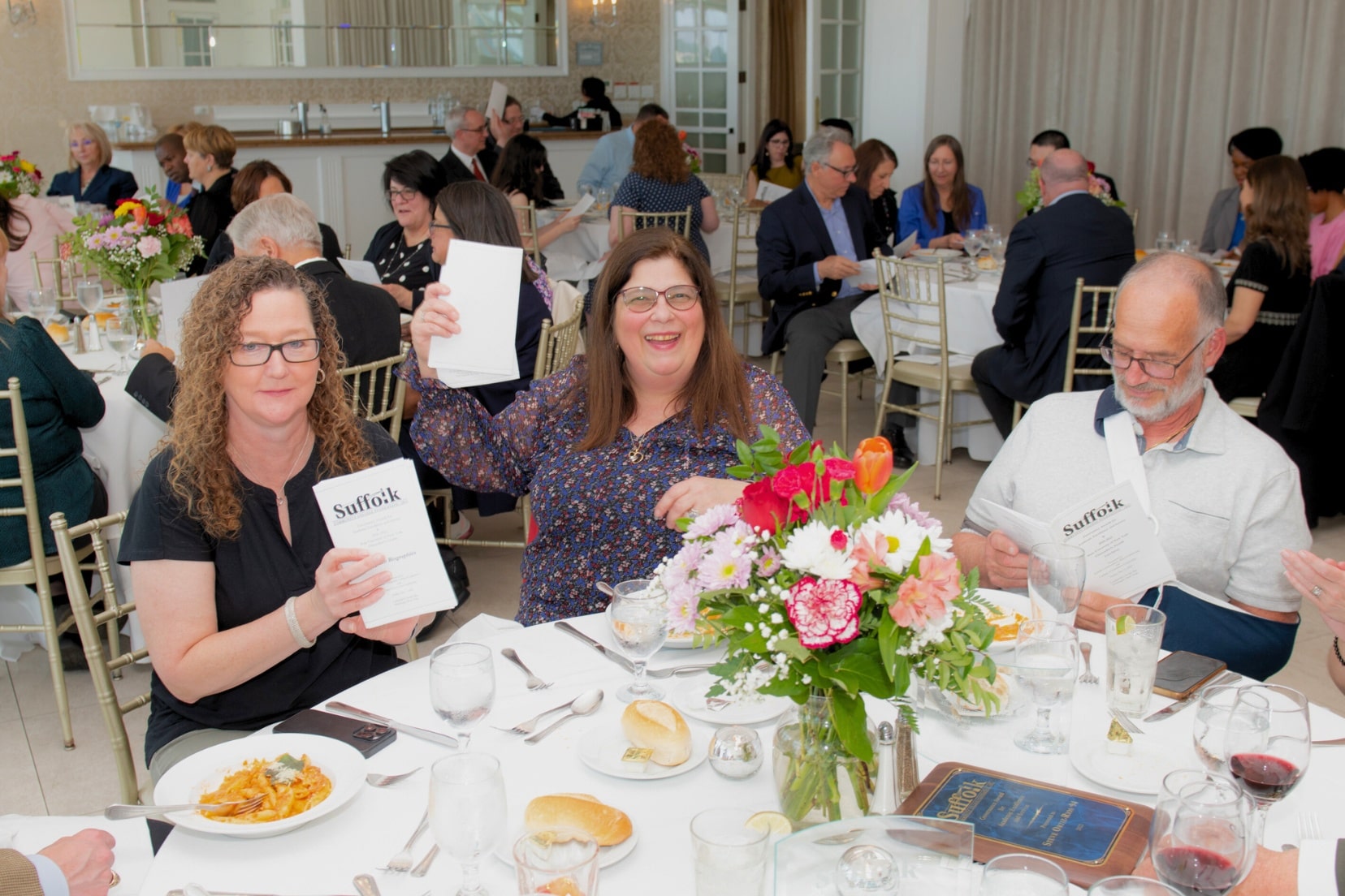 Faculty members at a luncheon celebration