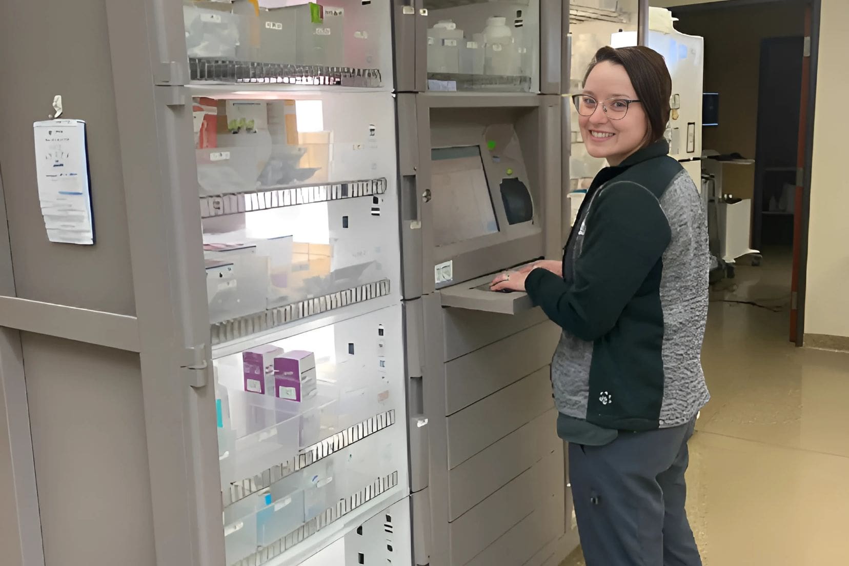 Image of a student standing in a lab