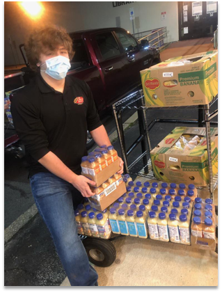 Dominic Porfido, a Suffolk County Community College Accounting major and soon-to-be member of the class of 2020, spends nights volunteering with his boss, John Murray owner of the Hero Joint in his hometown of Patchogue ensuring the hospital night shift doesn’t go hungry.