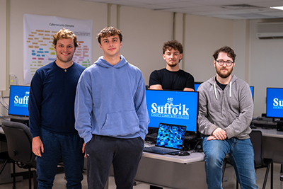 (Left to Right) Suffolk County Community College Cybersecurity students and team members Gabriel Liquori, Garrett Alpers, Maksym Tomenchuk, Miles Hannaford. For a hi-res image, visit: https://photos.app.goo.gl/3YMRjXC4zWhD5zex7