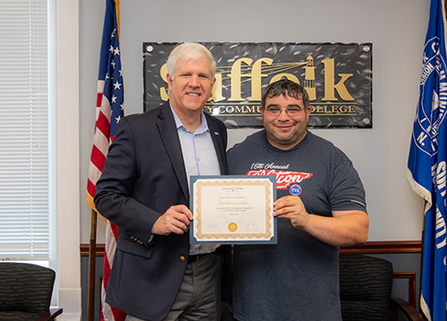 Suffolk County Community College’s President, Dr. Edward Bonahue, with Joseph Gonzalez, Class of 2024, the recipient of the prestigious Jack Kent Cooke Foundation Scholarship. For hi-res image visit: https://photos.app.goo.gl/CzVkCTUADJ7y1CbW8