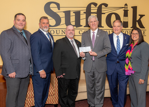 L to R: Plumbers Local 200 Organizer Edward Tedla, Business Agent Joseph Squicciarini, Business Manager - Financial Secretary/Treasurer Richard P. Brooks, Suffolk County Community College President Dr. Edward Bonahue, NY State Senator Mario Mattera and Sylvia A. Diaz, PhD, LMSW, executive director of the Suffolk Community College Foundation.