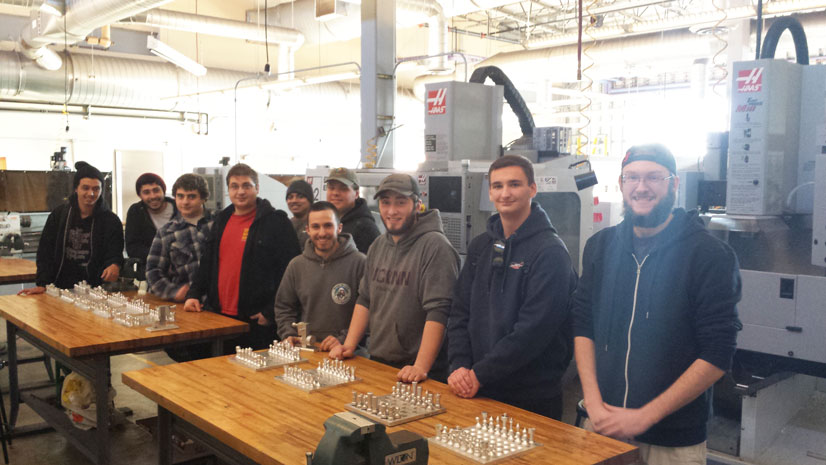 Chess Set Design Students with chess sets designed in advanced manufacturing