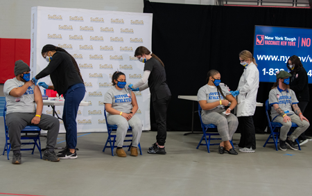 Suffolk County Community College students, from left, Jason Saravia, Gabrielle Flores, Kecia McKoy and Brian Higgins all received COVID-19 vaccinations at NYS Governor Andrew Cuomo's announcement at Suffolk’s Michael J. Grant Campus 