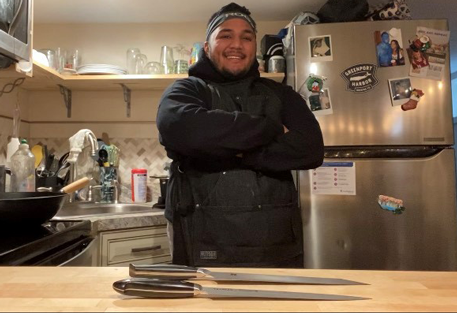 Suffolk culinary student Justin Ranghell in his kitchen